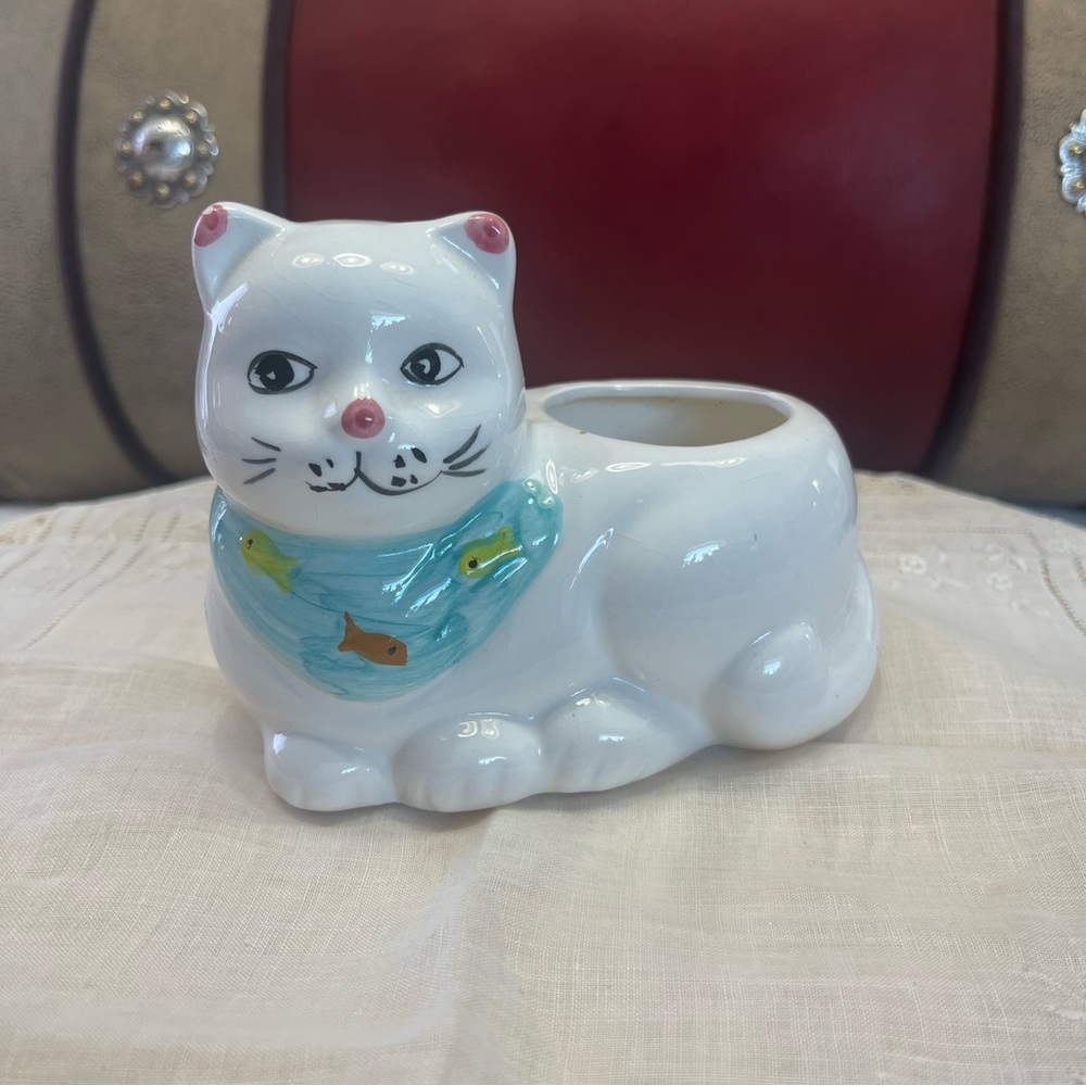 White Ceramic Cat-Shaped Planter with a Blue Scarf Adorned with Fish.